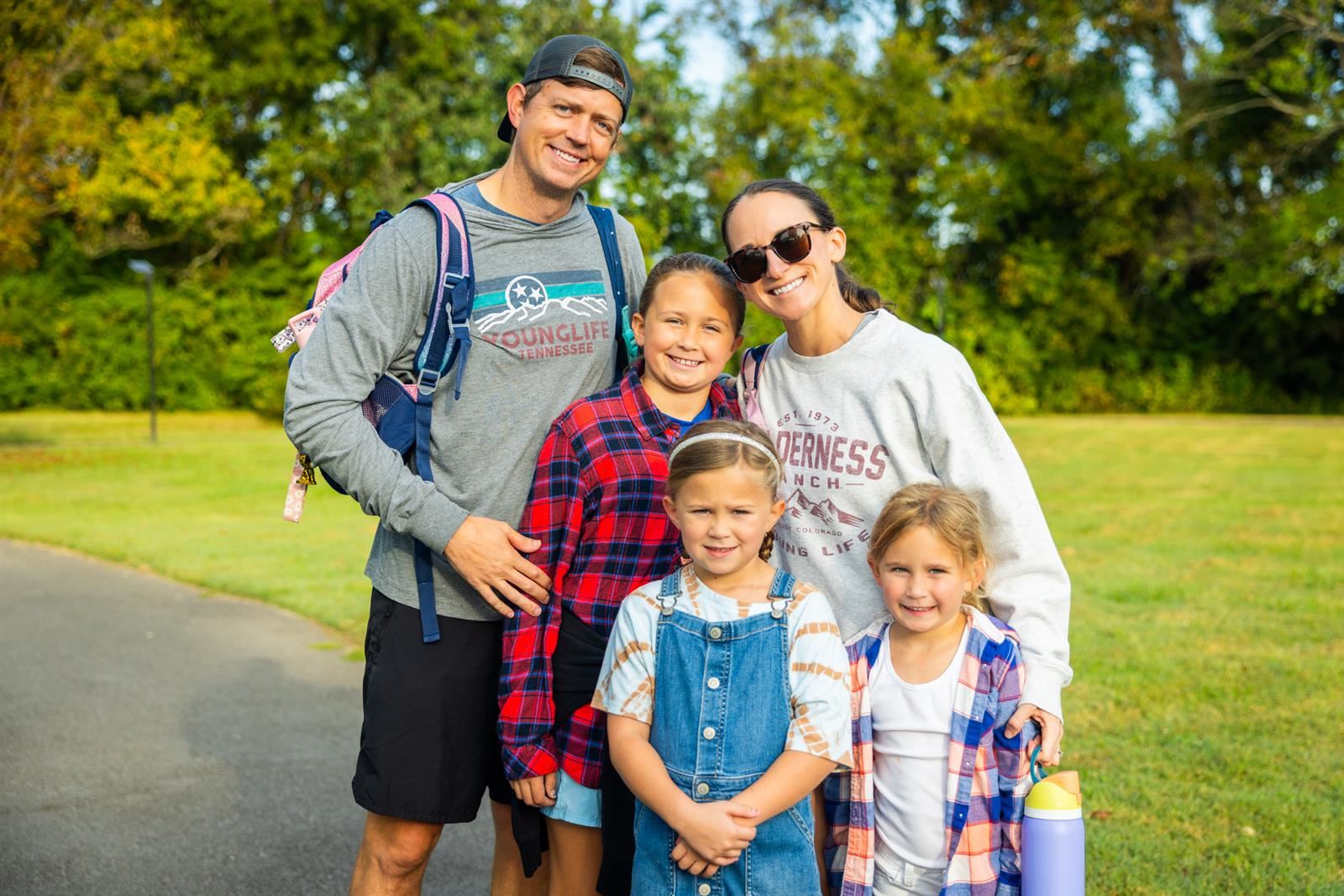 family on walk to school day